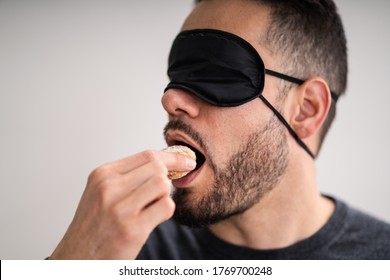 Blind Taste. Blindfolded Food Test. Man Face