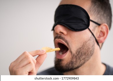 Blind Taste. Blindfolded Food Test. Man Face