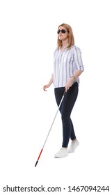 Blind Woman In Dark Glasses With Walking Cane On White Background