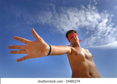 Blindfolded Boy Reaching Is Hand