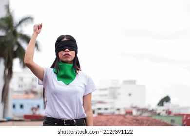 blindfolded girl at demonstration for legal abortion  - Shutterstock ID 2129391122
