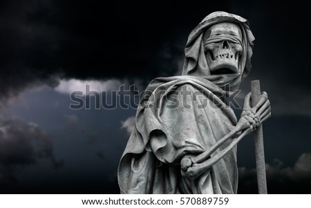 The blindfolded Grim Reaper Death personified wanders in the stormy night 