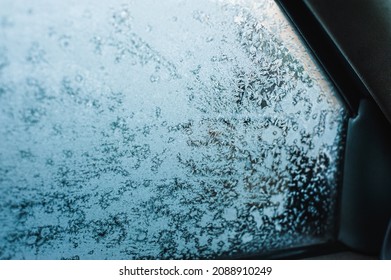 Blinding Oncoming Car Headlights. Frosted Car Glass.