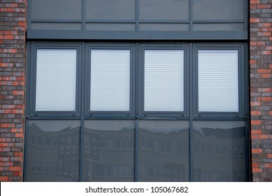 Blinds behind windows