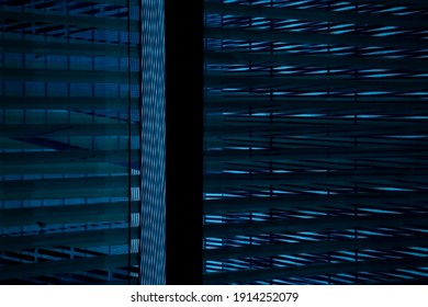 Blinds on windows. Abstract computer technology or modern business architecture background photo. Corporate datacenter or server room in office. Geometrical structure of stripes and parallel lines.