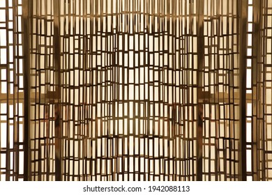 Blinds on windows in backlight. Abstract  technology, office interior design or modern architecture background photo. Geometrical grid structure of irregular stripes and parallel lines.