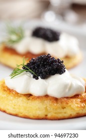 Blinis With Black Caviar And Sour Cream