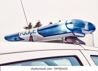 Blinkers Of A Police Patrol Car                               