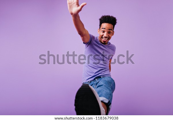 Blithesome Man Short Curly Hair Jumping Stock Image Download Now