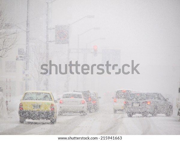 Blizzard on the Road and bad Visibility in\
Hokkaido, Japan.