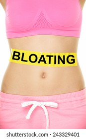 Bloating In Stomach Abdomen. BLOATING Text Written On Female Stomach. Bloated Due To Food Diet Conceptual Image.