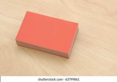 Block Of Business Cards On A Wooden Table