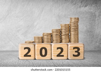 block with Coins stack. Money, Budget, tax, investment, financial, savings and Resolution concepts - Shutterstock ID 2201015155