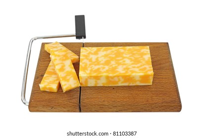 A Block Of Colby Jack Cheese That Has Been Sliced On A Cheese Cutting Board.