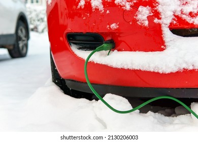 Block Heater Cable Plugged Into A Car On A Cold Winter Day To Warm Engine.