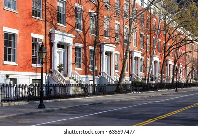 Block of historic buildings along an empty street near Washington Square Park in Manhattan, New York City NYC