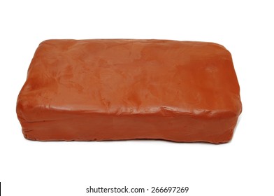 A Block Of Modelling Clay On A White Background