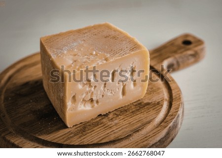 a block of Parmesan cheese