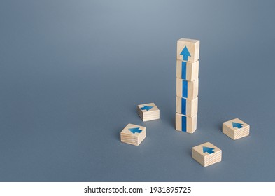 Block tower with arrows. Growth, development progress concept. Achieve success. Career promotion. Step by step. improving skills. Goal achievement. Progress and movement forward. Self improvement - Shutterstock ID 1931895725
