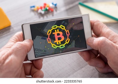 Blockchain concept on mobile phone - Shutterstock ID 2233335765