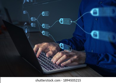 Blockchain financial technology to secure cryptocurrencies as bitcoin for online payments and money transaction. Fintech concept with encrypted ledger blocks chained. Person working on computer - Shutterstock ID 1894505215