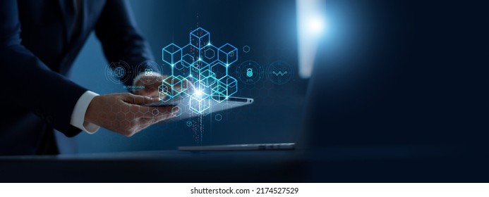Blockchain technology concept, Businessman use laptop and tablet on blockchain global networking, data network connect, Internet security binary coded. Crypto chain. 