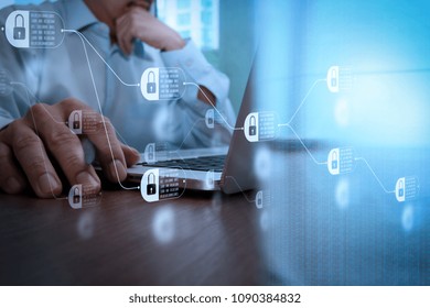 Blockchain technology concept with diagram of chain and encrypted blocks. close up of business man hand working on laptop computer with social media diagram on wooden desk