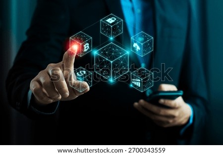 Blockchain technology and cryptocurrency network concept with businessman touching digital financial data cubes. Symbol of innovation, decentralization, fintech, and secure virtual transactions.
