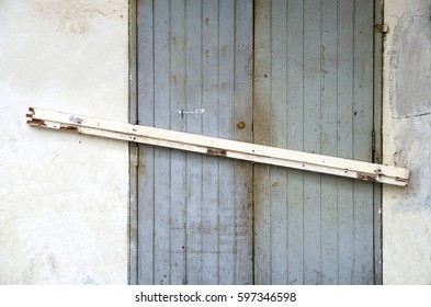 Blocked Door Of An Abandoned House Background