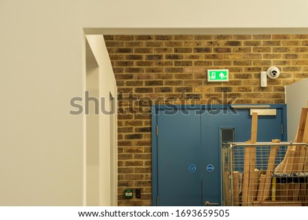 Blocked School Emergency Exit with Exit Sign