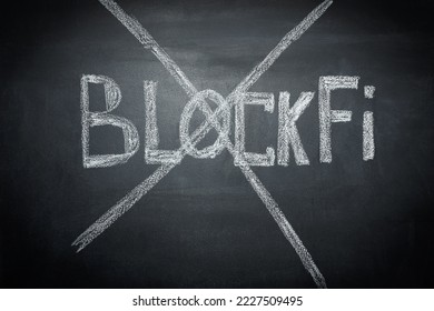 BlockFi is written in white chalk on the black board and crossed out. Close-up. The concept of the bankruptcy and collapse of the cryptocurrency exchange BlockFi - Shutterstock ID 2227509495