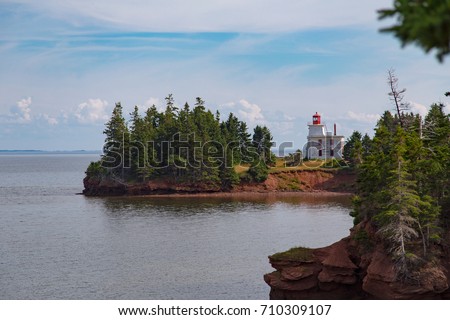 Blockhouse Point Lighthouse, located on Rocky Point on the west side of the Charlottetown Harbour entrance, Prince Edward Island, Canada  A historic building 