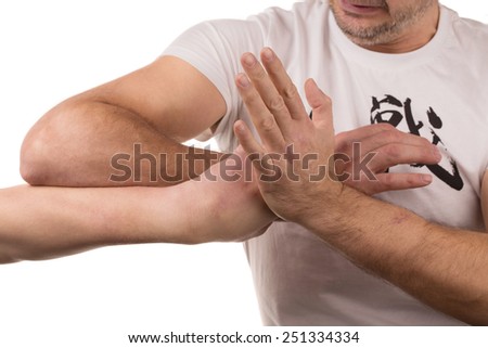 Blocking arms. Isolated on a white background.