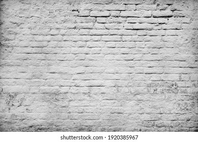 Cracking bumpy chalk stucco on aged antique dirty dusty shabby loft. Messy peeled grungy indoor rot on rustic faded stone. Worn stiff grimy decayed daub. Chipped brickwall relief blocks grunge facade