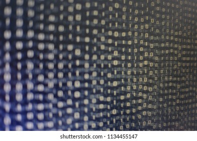blocks of binary data. Blockchain concept. blue background with computer digital binary code bit number one and zero text. selective focus on the far end of the computer display out of focus in front.