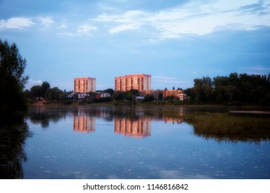 Blocks of flats reflection on the river
