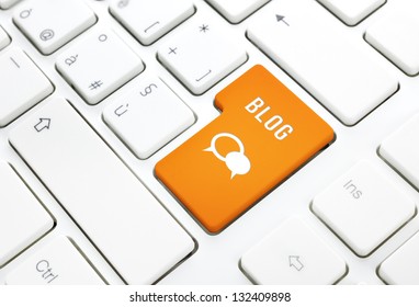 Blog Business Concept, Text And Icon. Orange Enter Button Or Key On White Keyboard Photography.