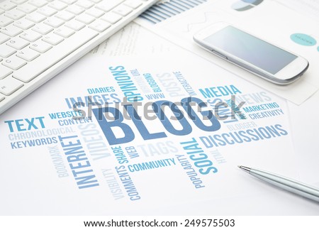 Blog concept cloud chart print document, keyboard, pen and smartphone.