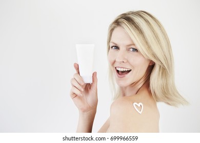 Blond And Beautiful Woman With Heart Shaped Beauty Regime