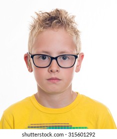 Blond Boy With Hearing Aid And Glasses