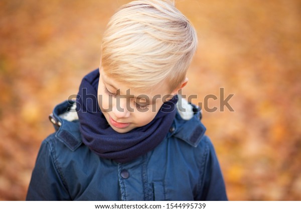 Blond boy with long layered hair - wide 1