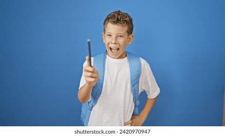 Blond boy student having idea smiling over isolated blue background - Powered by Shutterstock