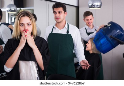 Blond Girl Complaining On New Haircut In Hair Salon