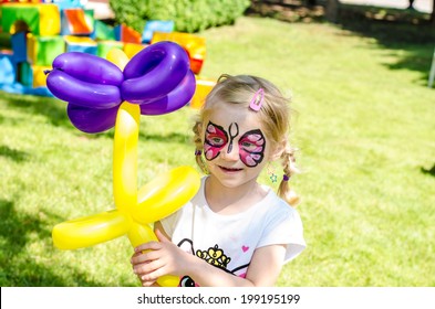 Blond Girl With Face Painting