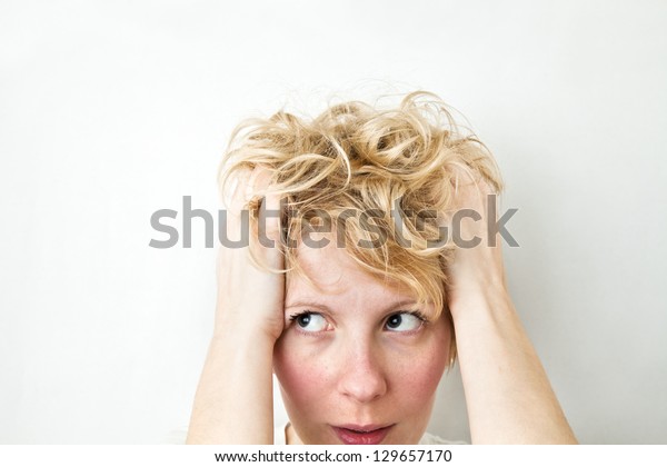 Blond Girl Pulling\
Hairs and looking left
