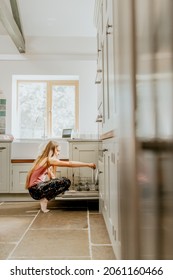 Blond Girl Unloading Dishwasher, Basic House Chores