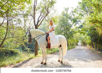 Blond Girl Woman Riding White Horse Stock Photo (Edit Now) 1102170905