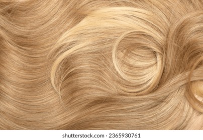 Blond hair close-up as a background. Women's long blonde hair. Beautifully styled wavy shiny curls. Hair coloring. Hairdressing procedures, extension. - Shutterstock ID 2365930761