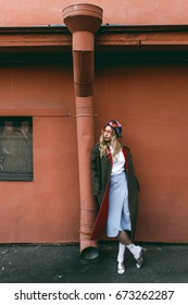 Blond model in cap