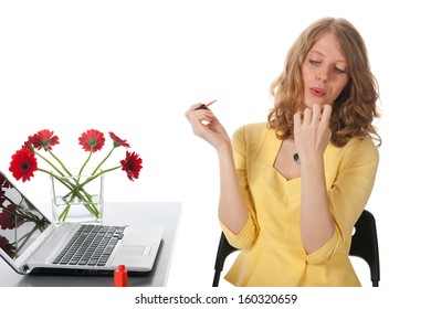 Blond Woman Bringing Red Nail Polish On Nails And Blowing To Dry